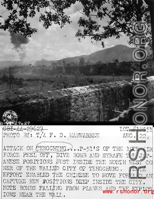 The allied attack on Tengchong (Tengchung) in Yunnan province, China, during WWII, showing the city wall. Note American P-51 in flight.   Photo by F. D. Manwarren.