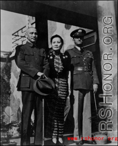 Chiang Kai-shek and Madame Chiang Kai-shek with Gen. Chennault in China during WWII.  From the collection of Hal Geer.