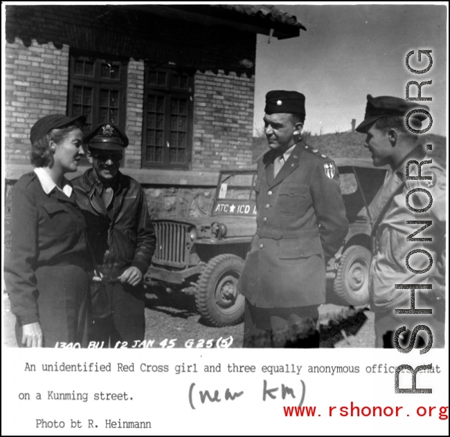 A "Red Cross girl" and American officers chat on a street in Kunming during WWII, on January 2, 1945. In the background is a jeep for ATC. 1340th AAFBU ATC Kunming China.  Photo from R. Heinmann.