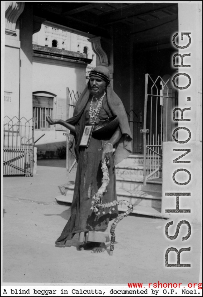 A blind beggar in Calcutta, India, during WWII.  Photo from O. P. Noel.