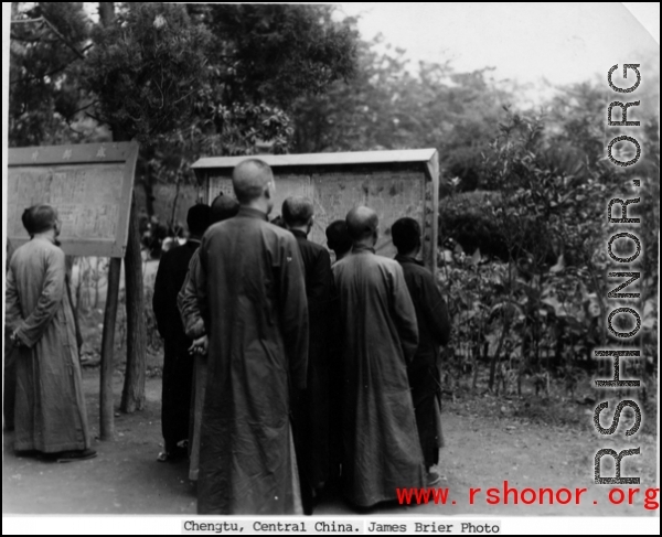 Monks reading news in Chengdu (Chengtu), China.  Photo from James Brier.