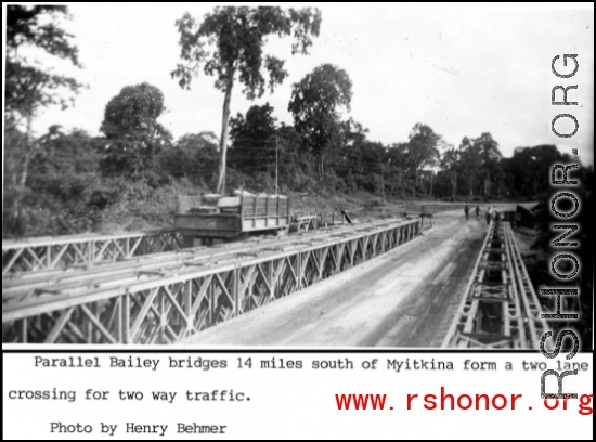 Parallel Bailey bridges 14 miles south of Myitkina form a two lane crossing for two way military traffic.   Photo from Henry Behmer.