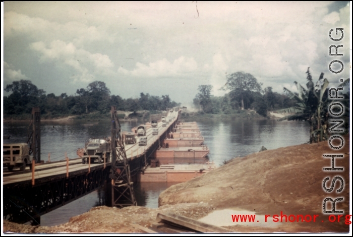 A floating or pontoon bridge in the CBI, probably part of road transport into China from Burma/India.