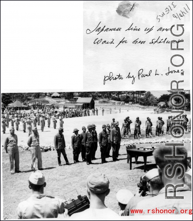 Japanese officers line up and wait to surrender to Gen. Stilwell in the CBI.  Photo by Paul L. Jones.