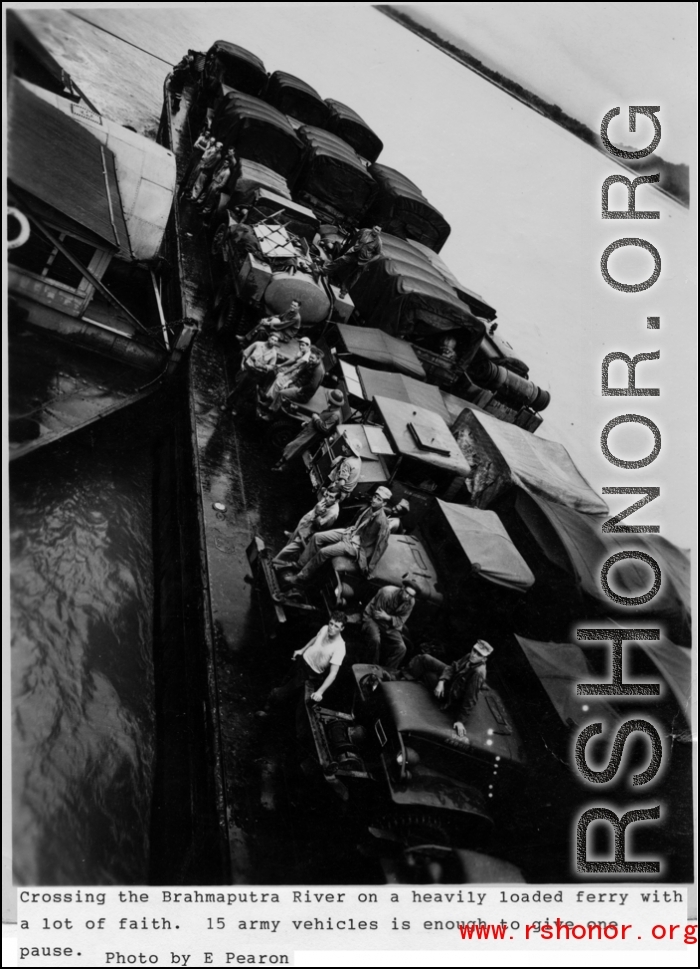 GIs and trucks crossing the Brahmaputra in heavily crowded ferry--this trip probably courtesy of the 327th Harbor Craft Company.  Photo from E. Pearon.  In the CBI.