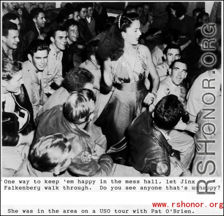 Jinx Falkenberg making GIs happy by visiting the mess hall during USO tour. In the CBI during WWII.