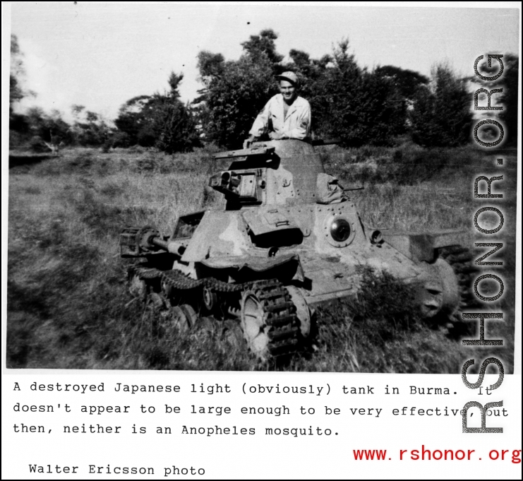 A GI climbs inside a destroyed Japanese light tank in Burma during WWII.  Photo from Walter Ericsson. 