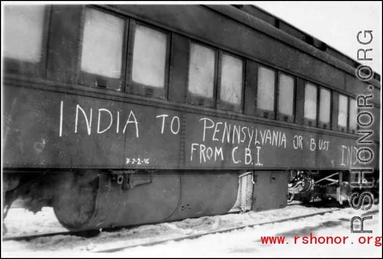 A train home in India, with the declaration "India to Pennsylvania or bust." After end of hostilities.