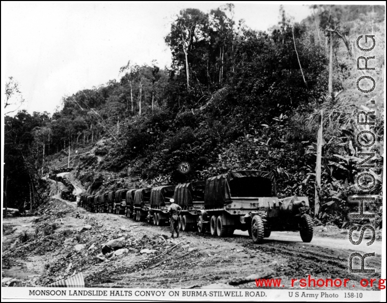 Monsoon landslide halts convoy on Burma-Stilwell Road. In the CBI.  U. S. Army Photo.