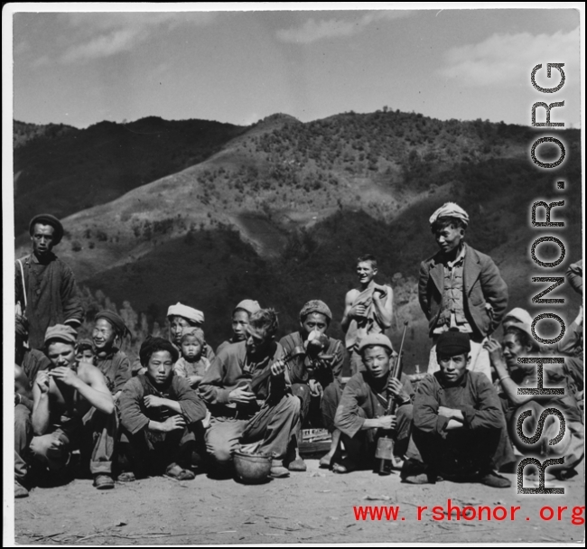 GIs play music and socialize with hill people in SW China during WWII.