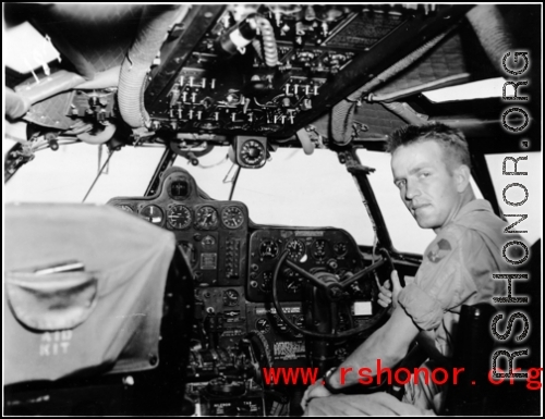 US serviceman in cockpit of transport aircraft. In the CBI during WWII.