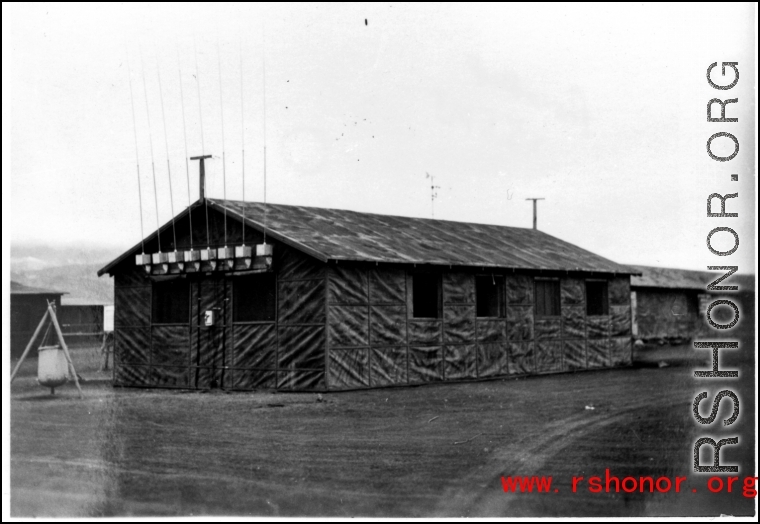 A building sprouting numerous radio antennas in the CBI during WWII.