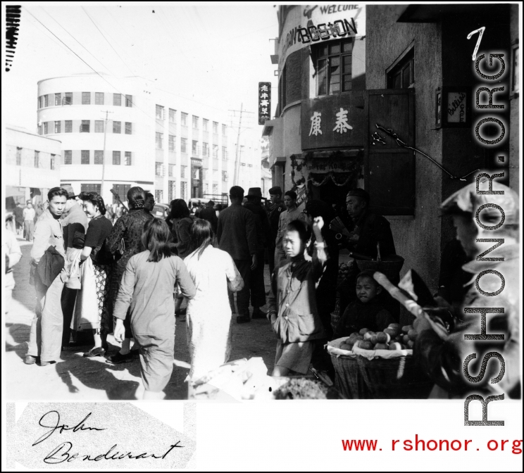 Street in Chinese city during WWII, possibly Kunming.  Photo from John Bondurant.