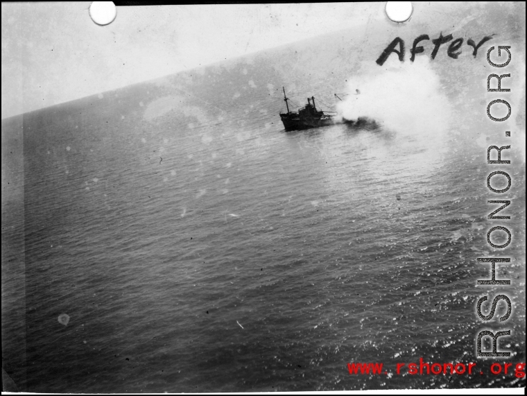 A Japanese boat sinking off the China shore after attack of American war planes during WWII.