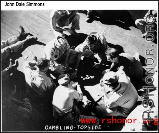 GIs gambling on the deck topside on the ship back home to the US after the war.  Photo from John Dale Simmons.