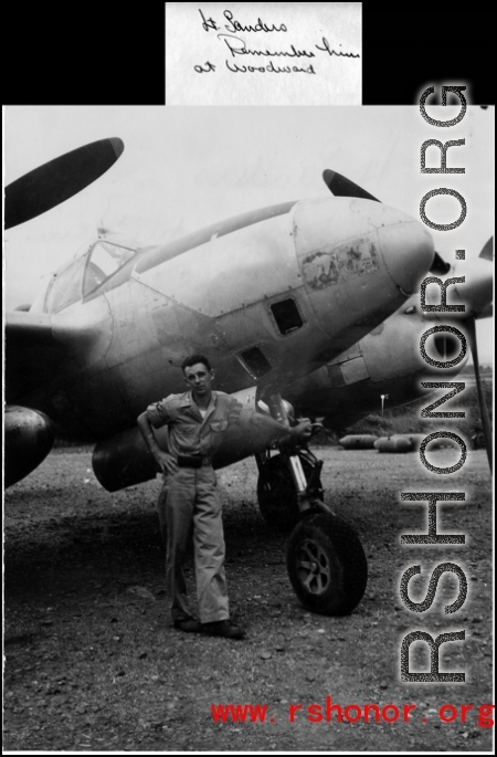 Lt. Sanders with a P-38 in the CBI.