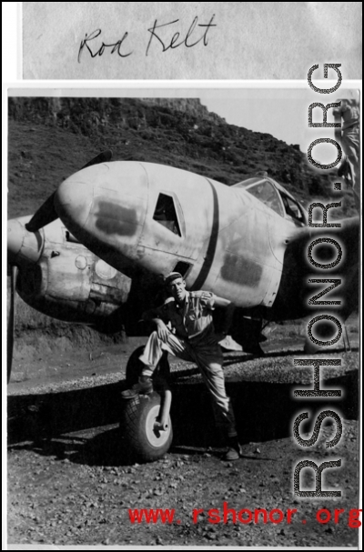 Rod Kelt poses with P-38 in Guangxi province, China, during WWII.