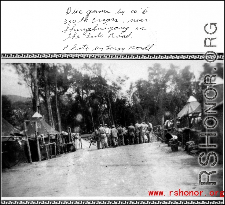 Dice game on the road by company "D" of 330th Engineers, near Shingbwiyang on the Ledo Road.  Photo by Leroy Nordt.