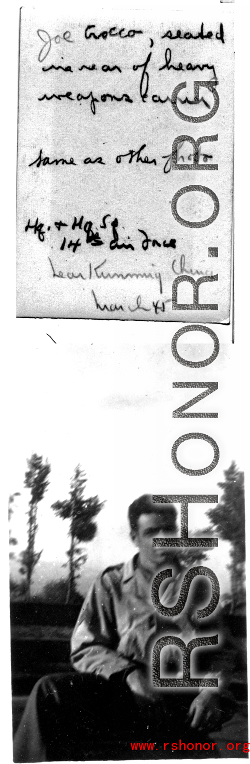 Joe Grocco seated in rear of heavy weapons carrier. Near Kunming, China, March 1945.