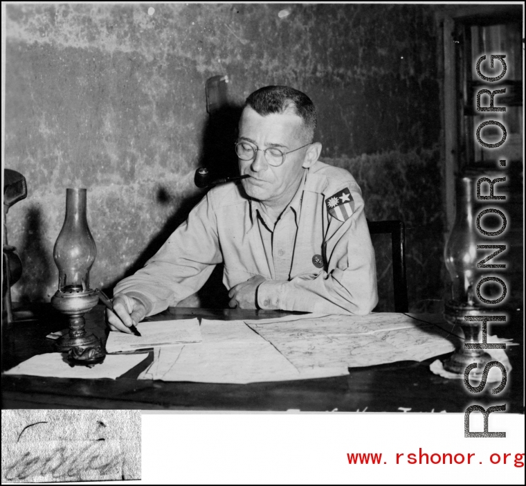 An American officer at his desk in the CBI during WWII.