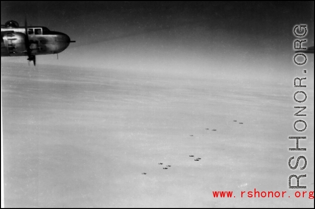 B-25s of the 491st headed for Burma (?) August 1944, putting a breach in a wall.