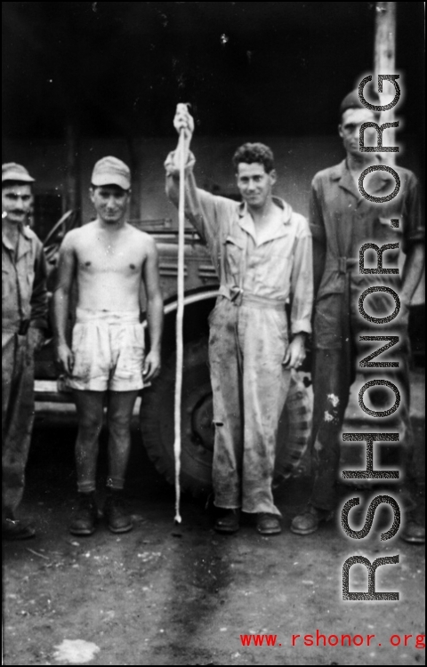 Nash, Nick Arico, and John Coffey, and the snake, at Luichow, Oct 1944.