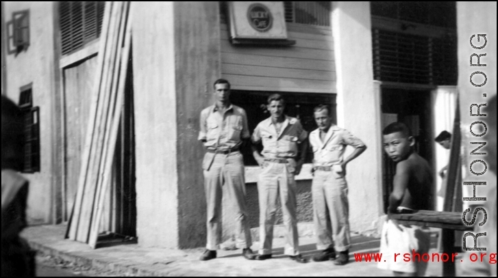 Frank Bates, Johnny Burns, and George Butsika at the Lucky Cafe in Liuzhou, China. Sept 1944.