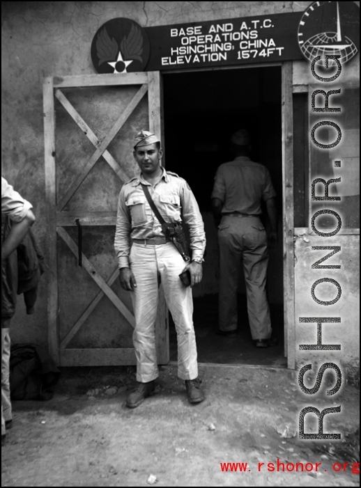 David Firman was a member of the 61st Air Service Group. Here he is standing at Hsinching, China.  10th Army Air Force.