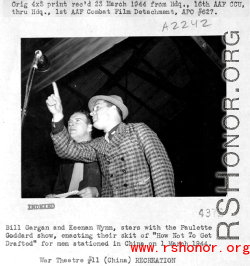 Bill Gargan and Keenan Wynn, stars with the Paulette Goddard Show, enacting their skit "How To Not Get Drafted" for men station in China on March 1, 1944.