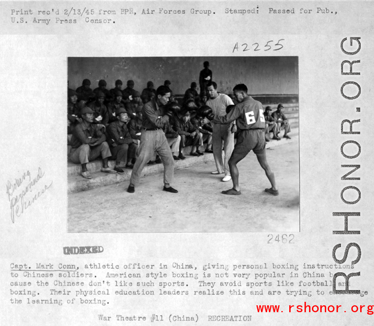 Chinese soldiers in the CBI learn western-style boxing under instruction of Capt. Mark Conn, during WWII.