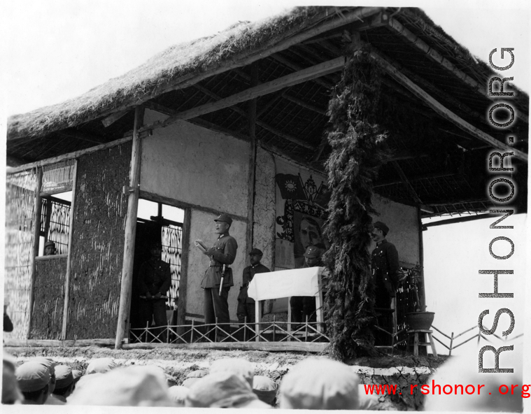 Chinese Lt. General Du Yuming, Nationalist 5th Corps (第五集团军总司令兼昆明防守司令杜聿明), makes speech during rally. Gen. Wei stands behind him.