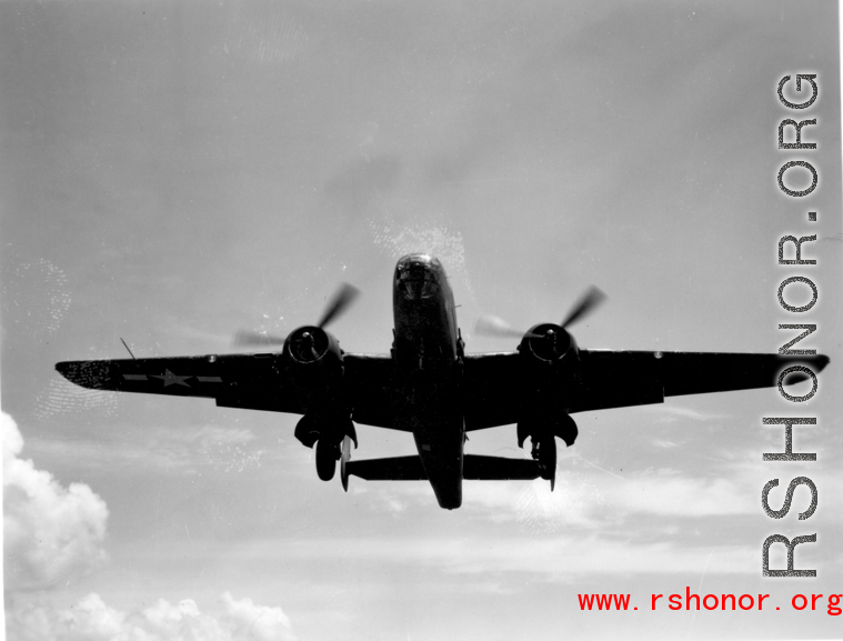 B-25 Mitchell bombers take off (or land) from an airstrip, possibly Yangkai (Yangjie) air strip in Yunnan province, China.