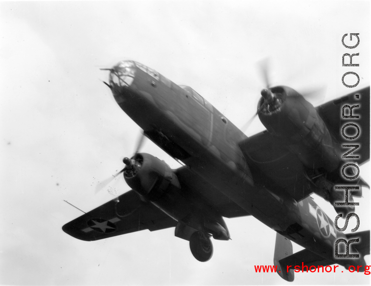 B-25 Mitchell bombers take off (or land) from an airstrip, possibly Yangkai (Yangjie) air strip in Yunnan province, China.