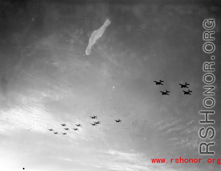 B-25 Mitchell bombers in flight in the CBI, in the area of southern China, Indochina, or Burma.