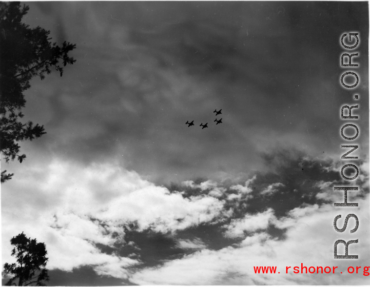 B-25 Mitchell bombers in flight in the CBI near an American air base, in the area of southern China, Indochina, or Burma. During WWII.