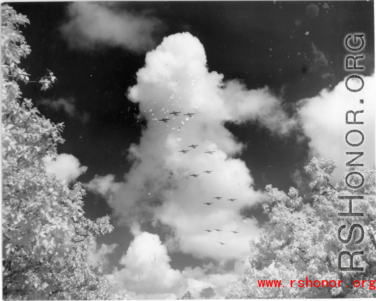 B-25 Mitchell bombers in flight in the CBI, in the area of southern China, Indochina, or Burma. During WWII.