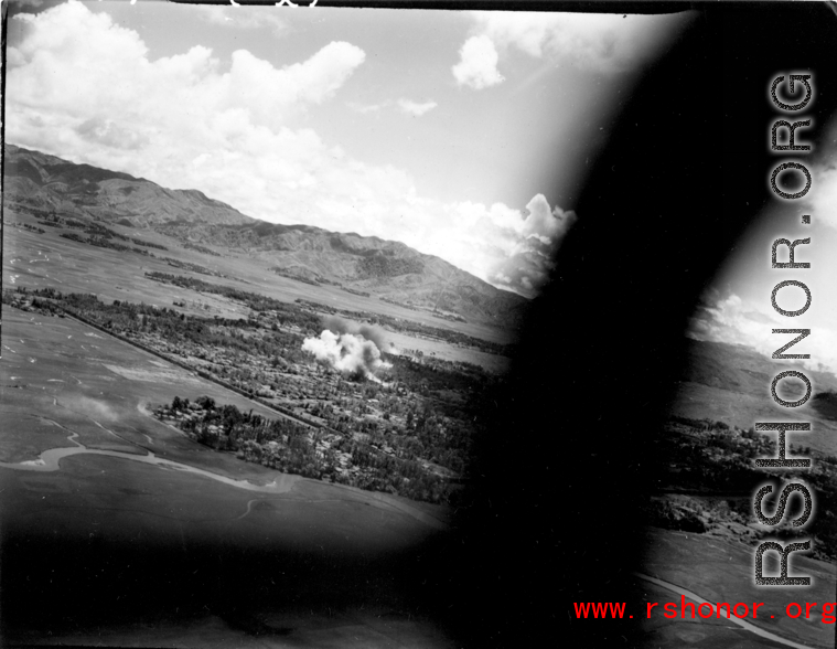 B-25 Mitchell bombers doing battle with Japanese ground forces, flying over Tengchung (Tengchong), near the China-Burma border in far SW China.