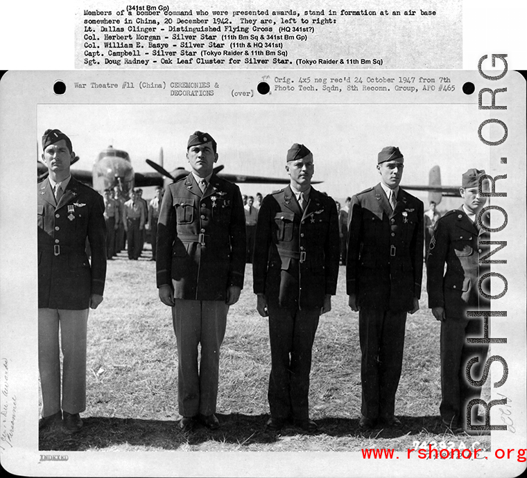 Members of the 341st Bomb Group are presented awards in 1942 in China on 20 December 1942.  They are:  Lt. Dallas Clinger Col. Herbert Morgan Col. William E. Basye Capt. Campbell Sgt. Doug Radney