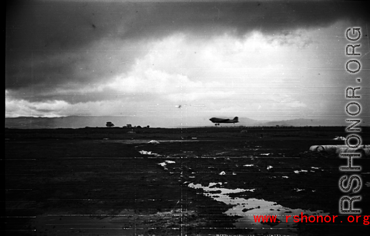 A C-47 lands at the base, probably Luliang in Yunnan province, China.