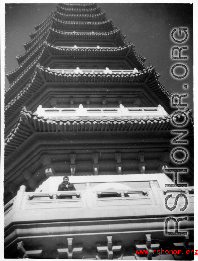 American woman on pagoda at Purple Mt. Park, Nanjing, China, late 1945.