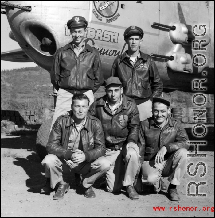 An aircrew of the 491st Bomb Squadron pose for photo with the "Wabash Cannonball", a B-25H, at Yangkai, Airbase, China, circa 1944.  Front row (left to right) - Cpl Glen A. Sneyd (engineer), S/Sgt Joseph A. Siana (armorer-gunner), T/Sgt Ashley F. Neary (radio);  Back - Capt. James L. Wolfe (bombardier), Lt. William H. Briggs (pilot).