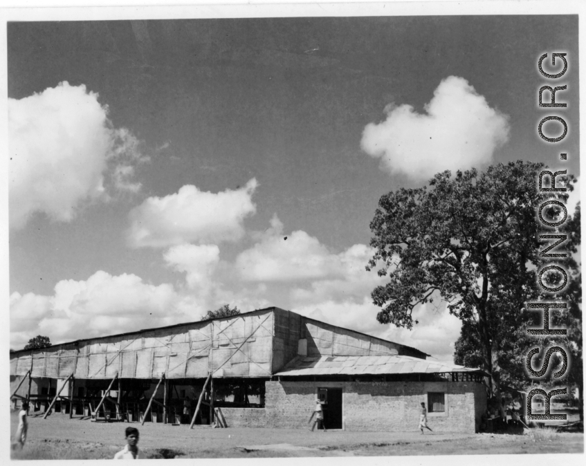 Covered theater area in India.  Scenes in India witnessed by American GIs during WWII. For many Americans of that era, with their limited experience traveling, the everyday sights and sounds overseas were new, intriguing, and photo worthy.