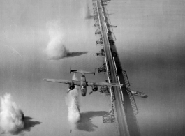 A B-25 on a bombing run over a bridge in the CBI.