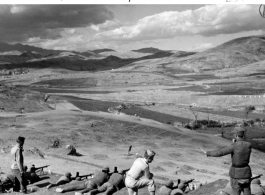 Light machine gun practice of Chinese troops, with American combat advisers instructing. Near Mitu, Yunnan. 1944. In the CBI during WWII.  U. S. Army Signal Corps photo.