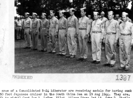 B-24 crew receives medal after sinking 550-foot Japanese cruiser in the South China Sea on August 19, 1944. Left to right: Capt. Jay E. Levan, 1st Lt. John D Shytle, Jr., 1st Lt. Lee O. Cunningham, T/Sgt. Harry A. Neiss, 2nd Lt. William R. McCaffrey, Jr., S/Sgt. Lawrence F. Bowar, T/Sgt. Charles W. Hemsley, S/Sgt. Thomas J. Murphy, S/Sgt. Bruce L. Ludwig, T/Sgt. Edward N. Odom.