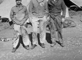 Christmas day, 1994, at Luliang, China. Pilot Lt. Harry Nelson had just told Engineer Wayne Blackburn and Radio Operator Dale Strohbehn (right) they were to fly gasoline to Suichuan (Suischwan) that day. Photo taken at Enlisted Men’s quarters, Luliang.  Photo from Dale Strohbehn.