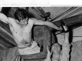 Some of personnel of photo lab at Hastings Mills CBI HQ, drinking beer on Sept. 1:  Bob Harrington (top of picture)  Spence (lower right)  S/Sgt. Bob Schoby (center)  Dave Rosen  George M. Zdanoff