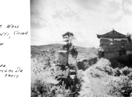 Chinese boys of decaying town wall around Chanyi, China, 1944.  Photo from Ralph Clothier.