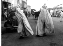 Women in full-body covering in Karachi, India, during WWII.  In the CBI during WWII.  Photo from Walter De Blair.