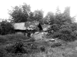 A village scene in India, with a small child in the middle.  Local images provided to Ex-CBI Roundup by "P. Noel" showing local people and scenes around Misamari, India.    In the CBI during WWII.